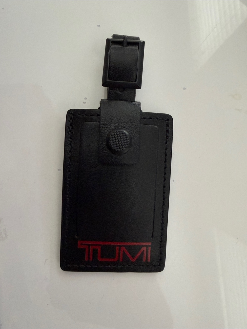 Tumi Black Leather Luggage Tag with Red Logo Accent
